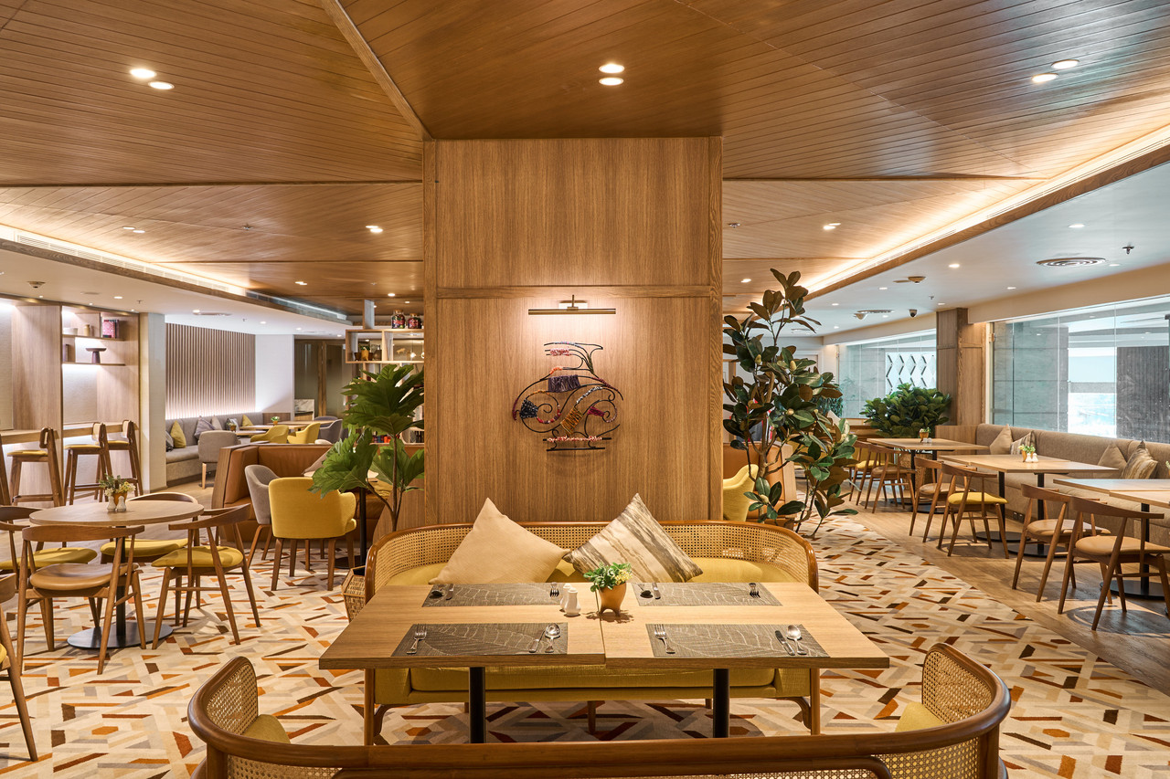 Ban Chiang restaurant with warm interior and Isaan artwork