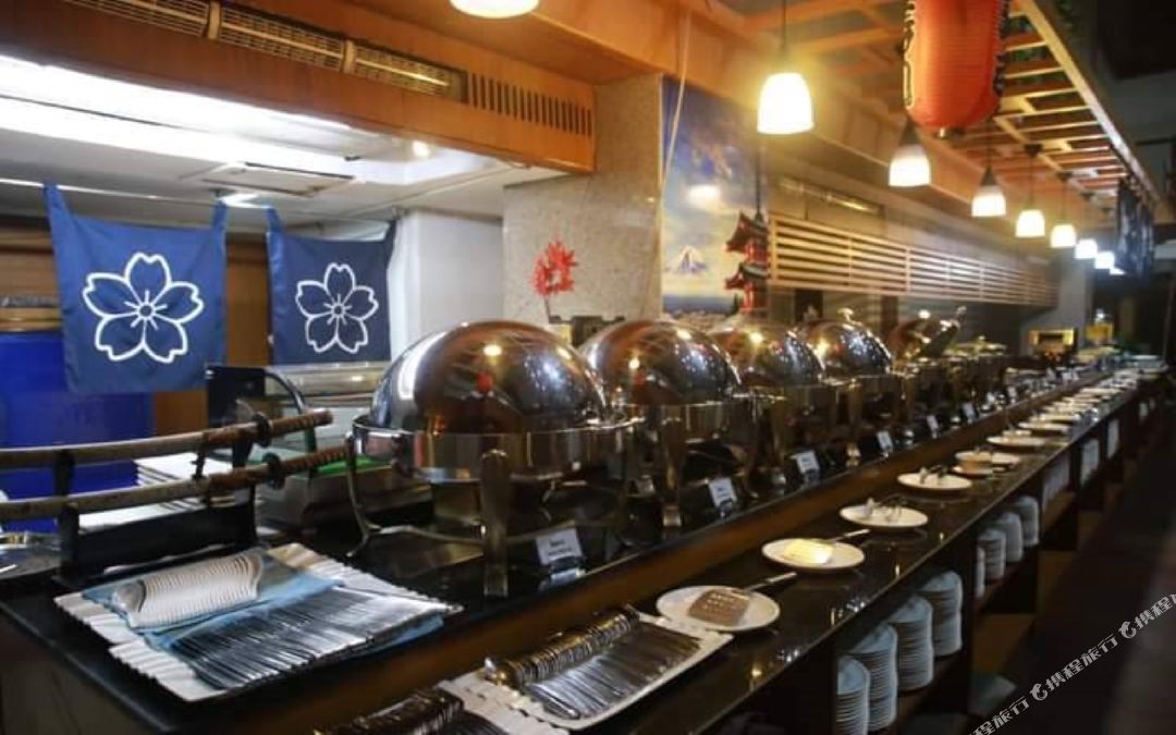 Hot Pot buffet line in the restaurant at Friday Hotel