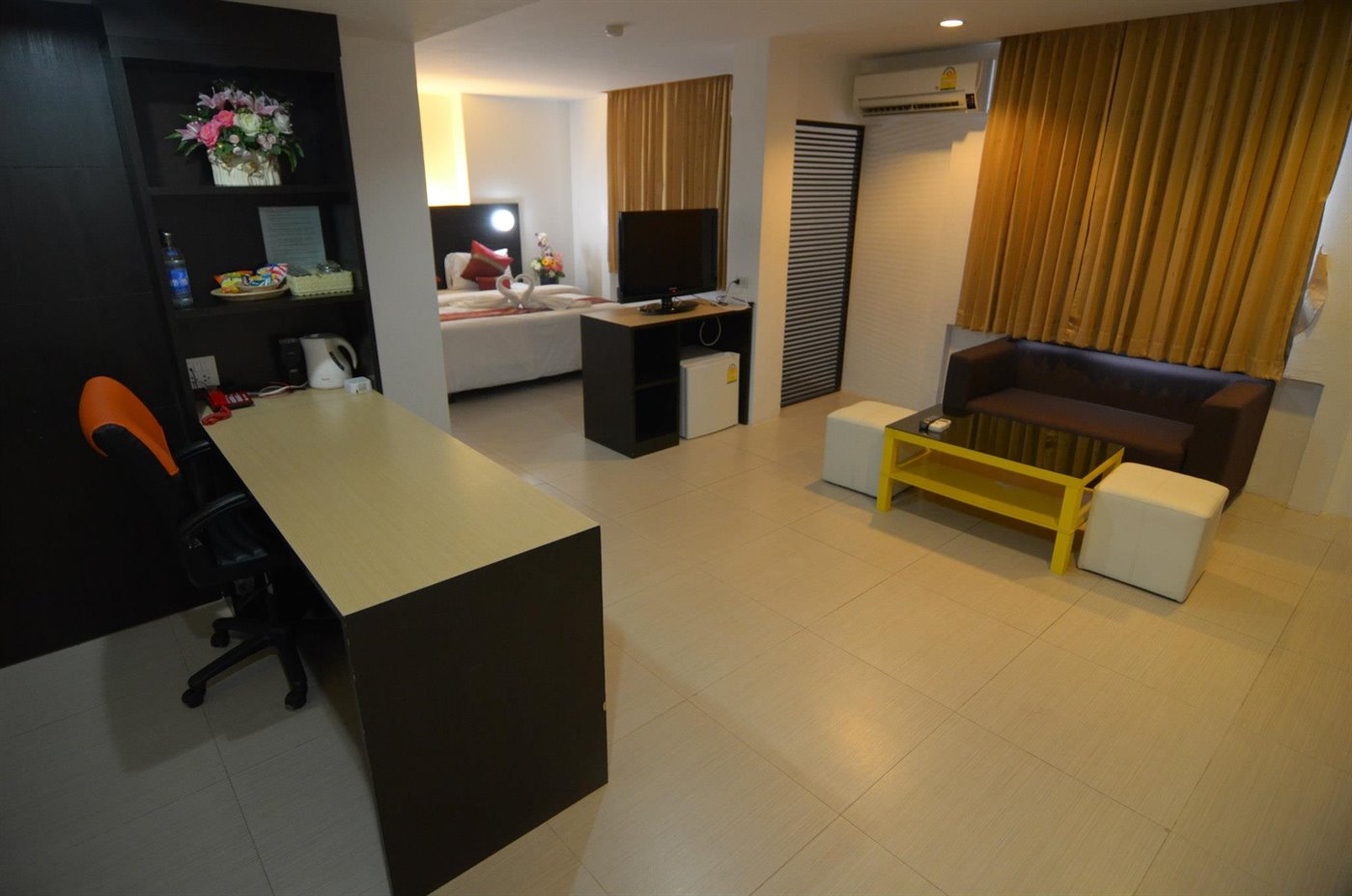 Suite with a separate sofa seating area apart from the sleeping space